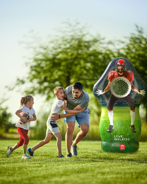 QPAU inflatable football target in action, life-sized design for backyard training and outdoor games